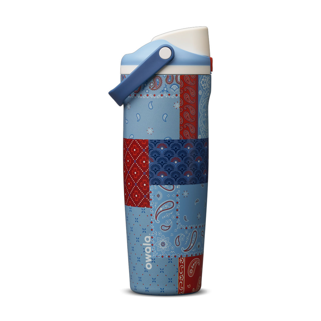 Owala FreeSip Sway 30oz, red, white, and blue paisley bandana patchwork body with light blue lid, white flip cap, and darker blue carry loop